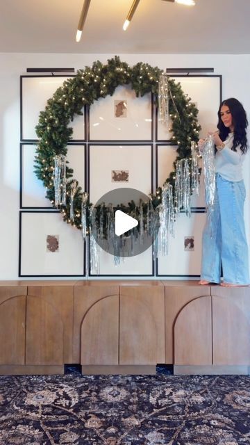 Summer Willis on Instagram: "Comment FUN and I’ll send you the link to shop this look.   You either love it or hate it! ☺️  72” Prelit Wreath! I use these wreaths in size 72” and 60” inside and outside of my home.  I used 4 packs of the 20inchx20 foot tinsel. The longer the tinsel the better my trees and wreaths look.   Instead of using lots of small decor, go big! 🌲  I LOVE it and wish you all could see it in person. It sparkles, sparkles, sparkles! ✨ Especially at night.   #christmasdecor2024 #christmasparty #christmasideas #christmaswreaths #christmasdecor" Tinsel Christmas Wreath, Tinsel Wreath Diy, Tinsel Tree Decorating Ideas, Prelit Wreath, Tinsel Wreaths, Townhouse Decor, Tinsel Wreath, Tv Nook, Tinsel Christmas