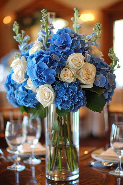 Stunning Blue Hydrangeas Wedding Ideas You Will Love • Blue Hydrangea Centerpiece, Blue Hydrangea Centerpieces, Pale Blue Hydrangea, Wedding Cake Hydrangea, Blue Hydrangea Bouquet, Classic Wedding Flowers, Blue Flower Arrangements, Blue Hydrangea Wedding, Blue Centerpieces