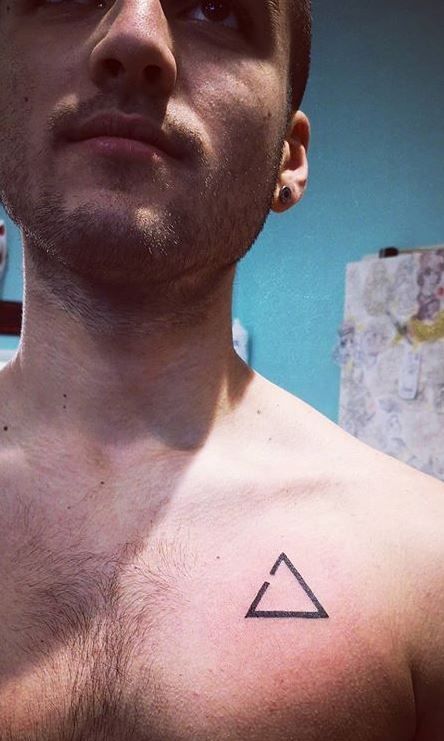 Chest tattoos for men are very popular nowadays. #tattoos Men’s Simple Chest Tattoos, Triangle Chest Tattoo, Small Center Chest Tattoo, Small Chest Tattoo Men, Dark Tattoos For Men, Small Tattoo Ideas For Men, Chest Tattoos For Men, Under Chest Tattoo, Small Chest Tattoos