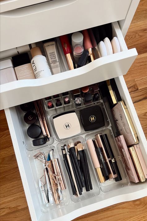 Half open makeup drawers showcasing a beautiful organized makeup collection with brands from Chanel to Too Faced displayed! Makeup Organization Cabinet, Malm Drawers Organization, Deep Drawer Organization Bedroom, Makeup Organization Drawer, Draw Organization, Organized Dresser, Ikea Drawer Organizer, Makeup Organization Ikea, Alex Drawer Organization