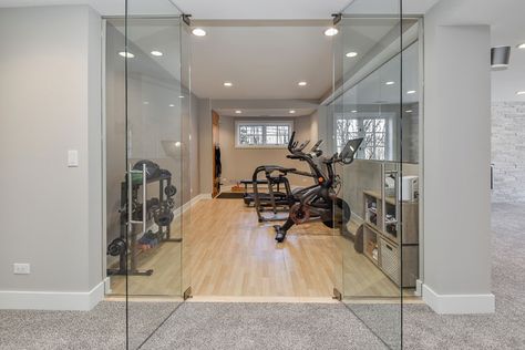 Basement Remodeling - Sebring Design Build Cost To Finish Basement, Workout Room Flooring, Basement Gym Ideas, Basement Home Gym, Gym Basement, Home Gym Basement, Hardwood Flooring Ideas, Remodeling Trends, Home Gym Flooring