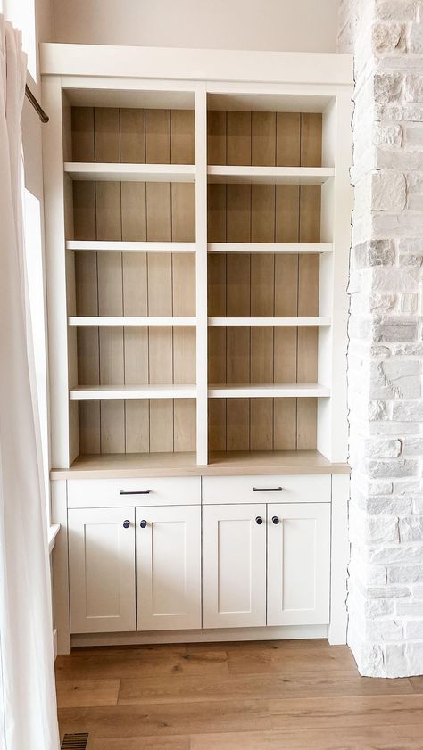 Natural Wood Bookshelves Built Ins, Wood Stained Built Ins, Built In Book Shelf Wood Back Wall, Taupe Built Ins Bookshelves, Arch Built In Shelves Light, White & Oak Bookcase With Doors Living Room, White Built Ins, Bead Board Walls, Living Room Built Ins