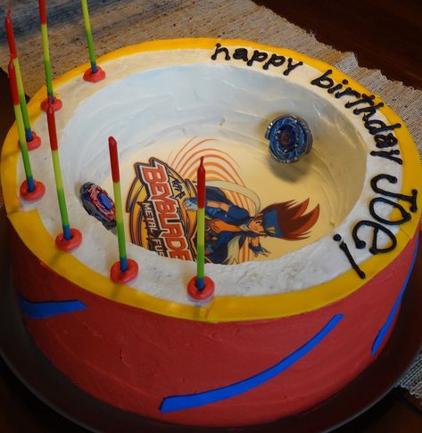 Beyblade Arena Cake - CakeCentral.com Beyblade Storage Ideas, Beyblade Birthday Cake, Beyblade Party Ideas, Beyblades Party Ideas, Bayblade Party Ideas, Bayblade Cakes, Bey Blade Birthday Party, Beyblades Cake, Beyblade Cupcakes