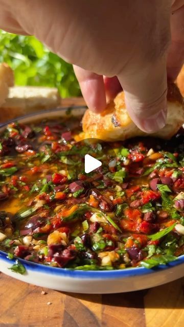 Brandon Frohne on Instagram: "Can’t stop thinking about this Smoky Tomato Dipping Oil! 🤤  Make sure to save this for an incredibly delicious and easy Summer appetizer, and share with someone you would smash this plate of deliciousness with!✌️  🔥Smoky Tomato Dipping Oil 🍅  1 cup Extra Virgin Olive Oil 2 tbsp Aged Balsamic Vinegar  1/4 cup Chopped Sun Dried Tomatoes 1/4 cup Chopped Pitted Olives  1 tbsp Minced Garlic 1/4 cup Chopped Italian Parsley 2 tbsp Basil Chiffonade Zest 1 Lemon 1 tsp Spanish Smoked Paprika  2 tsp Red Pepper Flake Pinch of Flaky Salt   Mix all this goodness together and let it marinate for at least 15 minutes to let the flavors wake up! 🫠  Serve with some warm ciabatta bread and take a deep breath because this one is going to rock your world!🫠 . . . . #tasty #deli Bread Dipping Oil, Bread Dipping, Summer Appetizers Easy, Italian Parsley, Dipping Oil, Cajun Cooking, Ciabatta Bread, Flaky Salt, Summer Appetizer