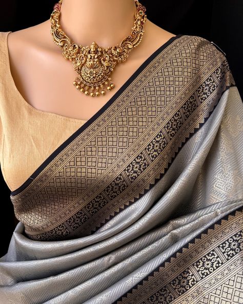 ₹ 1690/- Ash grey art silk saree with black zari border. Comes with contrast black pallu and blouse. Wash care: Normal wash. Find this saree in our website: Www.thejacouture.in> silk sarees> Ash grey art silk saree. Jewellery from: @anvi__jewellery #saree #artsilksarees #greysaree #sareelove #traditionalsaree #sareestyle #sareedraping #jewellery Luxury Silver Silk Saree, Silk Saree Jewellery, Silver Semi-stitched Art Silk Saree, Bollywood Style Silver Tussar Silk Saree, Silver Zari Weaving Unstitched Saree, Luxury Silver Tussar Silk Saree, Grey Saree, Saree Jewellery, Art Silk Sarees