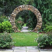 Stone moongate ~ lovely focal point as well as opening to pathway.  Well done! Moon Gate Garden, Gate Garden, Koti Diy, Moon Gate, Garden Vines, Stone Arch, Landscape Designs, Moon Garden, Garden Gate