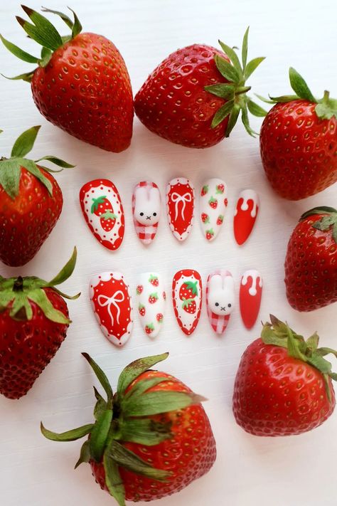 Adorable Strawberries and cream themed nails with the cutest white rabbit out there! It's like a cute little picnic theme as well! These nails you will love! All characters on this set are all handmade in 3D. And all hand painted by me. Treat yourself to these cute press on nails! Display nails are in Medium Almond. *Note: Will Not be able to have extra short length nails for this kind of design* Hi and Welcome everyone! I hope you enjoy taking a look at all our nail designs. I sell LUXURY press Nails Design Strawberry, White Rabbit Nails, Strawberry Themed Nails, Press On Nails Display, Short Length Nails, Strawberry Shortcake Nails, Picnic Nails, Cute Press On Nails, Strawberry Nail