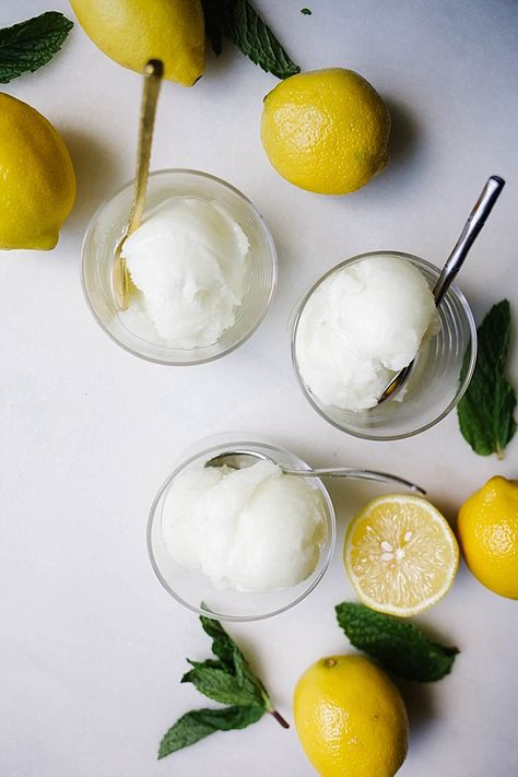 Lemon Mint Sorbet Recipe by The Wood and Spoon Blog by Kate Wood. This is a refreshing, frozen, lemon and mint sorbet made with freshly squeezed lemon juice, mint, and simple syrup. This ice cream is made in a ice cream maker and requires very little acti Mint Sorbet, Lemon And Mint, Sorbet Recipe, Hot Lemon Water, Lemon Health Benefits, Lemon Uses, Frozen Lemon, Lemon Water Benefits, Squeezed Lemon