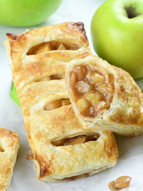 Two pieces of Copycat McDonald’s Apple Pies with apple behind. Pumpkin Apple Pie, Mcdonalds Apple Pie, Puff Pastry Cream Puffs, Apple Pie Cookies, Apple Puff Pastry, Apple Turnovers, Classic Apple Pie, Simple Breakfast, Caramel Apple Pie