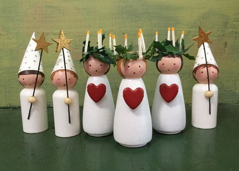 Santa Lucia and Star Boys by Jone Hallmark Christmas Peg Dolls, Jone Hallmark, Christmas Clothespins, Wood Peg Dolls, Swedish Christmas, Peg People, Clothespin Dolls, Peg Doll, Santa Lucia