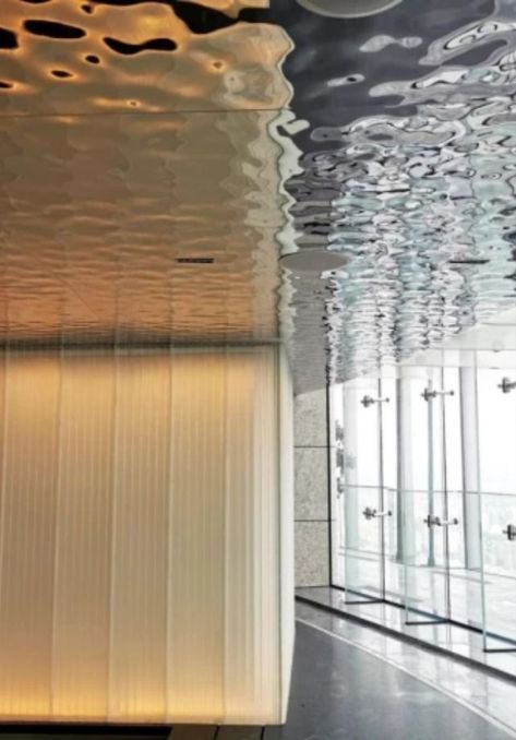 Water ripple stainless steel sheets are often used in interior ceilings. The water ripple pattern is reflected on the tile floor, giving the whole interior a shimmering effect.  #stainlesssteel #stainlesssteelsheet #decorativestainlesssteelsheet #waterripplestainlesssteelsheet #interiorceiling #ceilingdesign #ceilingdecor #interiordesign Water Ripple Stainless Steel, Canopy Ceiling, Ceiling Interior, Steel Sheets, Facade Material, Stainless Steel Sheet, Water Ripples, Metal Ceiling, Steel Sheet