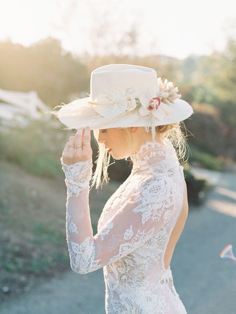 bride wearing hat with flowers Wedding Suits For Bride, Bridal Hats, Outdoor Winter Wedding, Embellished Wedding Dress, Red Bouquet Wedding, Bride Hat, Bridal Hat, Wedding Dress Trends, Wedding Hats