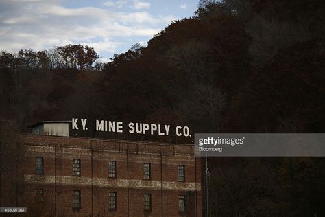 The Kentucky Mine Supply Company building stands in Harlan, Kentucky, U.S., on Tuesday, Nov. 5, 2013. In 2011, coal was used to generate 30.3 percent of the world's primary energy, the highest level since 1969, according to the World Coal Association, an industry trade group. That share slipped only to 29.9 percent last year. Photographer: Luke Sharett/Bloomberg via Getty Images Harlan Kentucky, Harlan County, Company Building, My Old Kentucky Home, Road Trips, Genealogy, To The World, Kentucky