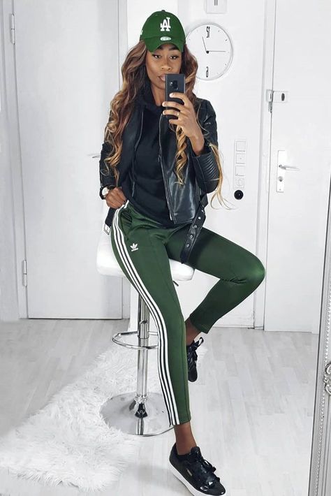 Green Adidas Pants With Moto Jacket Outfit #motojacket ★ Just like a little black dress, Adidas pants outfit is an irreplaceable wardrobe detail for a modern lady. You can’t even imagine how versatile this item is! Well, this post will help you out. See how to wear the classic black, pink, and red sweatpants with heels and combine them with a jean jacket. P.S. These ideas will never go out of fashion! ★ #adidaspants #adidas #adidasoutfit Green Adidas Pants, Sweatpants Outfit Women, Adidas Track Pants Outfit, Adidas Sweatpants Outfit, Adidas Pants Outfit, Adidas Leggings Outfit, Adidas Sst, Moto Jacket Outfit, Sweatsuit Outfit