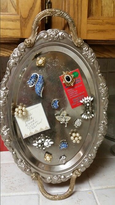 Repurposed silver tray with old jewelry made into magnets for a Message board Old Jewelry Crafts, Silver Platters, Vintage Jewelry Repurposed, Vintage Jewelry Crafts, Vintage Jewelry Art, Vintage Trays, Silver Trays, Repurposed Items, Repurposed Jewelry