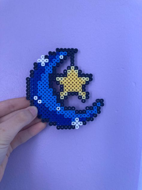 Cute handmade moon and hanging star perler bead creation blue and yellow moon and star cute and handmade perler beads Star Perler, Perler Bead Designs, Melt Beads Patterns, Hamma Beads Ideas, Easy Perler Bead Patterns, Perler Creations, Pokemon Perler Beads, Melty Bead Patterns, Pearl Beads Pattern