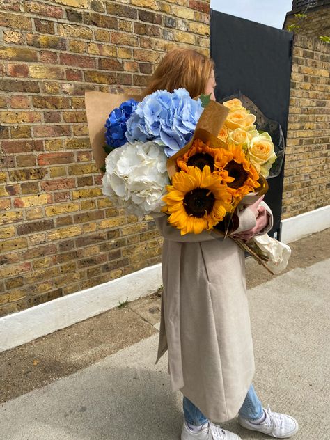 Girl holding big bouquet of flowers Columbia Flower Market, Columbia Road Flower Market, Columbia Road, Flower Market, Hydrangea, Columbia, Chloe, Sunflower, Roses