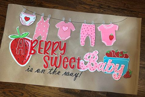 THIS LISTING IS FOR THIS SPECIFIC FINISHED BANNER AND READY TO SHIP.  If you are interested in a custom banner,  please message me first to see availability and  for a a quote. Berry Theme Baby Shower Banner "A Berry Sweet Baby is on the way!" Strawberries and clothes line of sweet pink baby clothes. This banner measures about 48 inches wide by 30 inches tall. Painted on brown Kraft paper. Easy to hang, light weight.  Banner is rolled and shipped in box. This listing is for this specific finishe Baby Shower Painted Banner, Brown Paper Banner, Pink Baby Clothes, Painted Banner, Sweet Baby Shower Ideas, Baby Pink Clothes, Strawberry Baby, Banner Ideas, Baby Banners