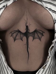 Dragon On Stomach Tattoo, Dragon Tattoo On Chest Women, Tattoo Ideas Female Back Spine Dragon, Dragon Spinal Tattoo, Chest Tattoo Female Dragon, Sternum Dragon Tattoo, Dragon Lower Back Tattoo, Dragon Tattoo Sternum, Dragon Sternum Tattoo Women