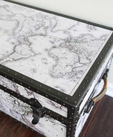 paint furniture- Antique Trunk Makeover - A beat up old military trunk gets a fresh start with a customizeable world map, casters, and spray paint. Stripping the paint of the metal was the hardest part. Trunk Upcycle, Antique Trunk Makeover, Honeysuckle House, Trunk Redo, Painted Suitcase, Paint Stripping, Trunk Makeover, Metal Trunk, Trunk Ideas