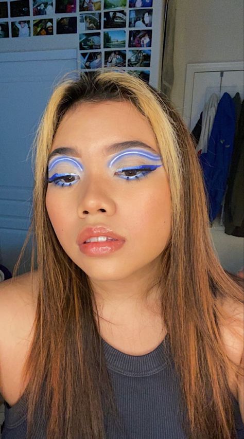 girl with blue neon inspired makeup on Neon Blue Makeup, Blue Y2k Outfit, Blue Makeup Look, Makeup Neon, Blue Makeup Looks, Neon Makeup, Blue Y2k, Y2k Outfits, Blue Makeup