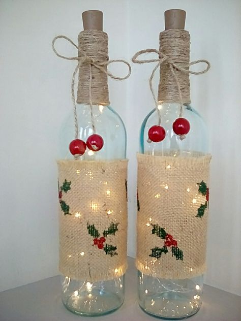 Diy Christmas Bottles Decor, Christmas Bottles Decoration Xmas, Xmas Bottle Decoration, Christmas Glass Bottle Crafts, Liquor Bottle Christmas Crafts, Christmas Wine Bottles With Lights, Christmas Bottles Diy, Christmas Bottle Ideas, Christmas Bottle Art