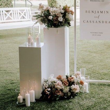 Premium plinths — Aurora + Co Events Plinths Wedding, Wedding Flower Plinth, Wooden Plinths Wedding, Ceremony Plinth Flowers, White Plinth Wedding Ceremony, Clear Plinths With Flowers, Wedding Pillars, Wedding Welcome Table, Flowers Australia