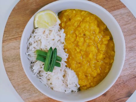 A traditional Indian recipe, easy to make, nutritious, and so delicious! Cook Toor Dahl (or yellow peas) until soft, caramelize the onion with spices, add the cooked dal and cook for about ten minutes; season with lemon juice, and enjoy. Yellow Dal, Yellow Lentils, Using A Pressure Cooker, Indian Recipe, Lentil Stew, Global Cuisine, Vegetarian Chili, Indian Cooking, South Asian