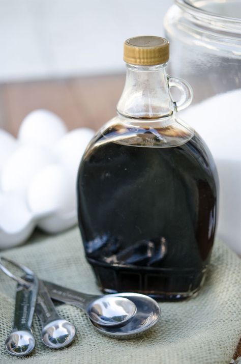 An empty raspberry syrup bottle is repurposed for holding vanilla in the kitchen.  Find more useful glass storage ideas at www.andersonandgrant.com Glass Storage Ideas, Repurpose Glass Jars, Unique Kitchen Storage, Maple Syrup Bottles, Syrup Bottle, Raspberry Syrup, Unique Storage, Homemade Hot Chocolate, Clear Glass Jars