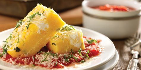 Baked Polenta with Tomato Sauce and Ricotta recipe | Epicurious.com Baked Tomato Recipes, Grain Dishes, Cornmeal Recipes, Ricotta Recipe, Polenta Recipe, Baked Polenta, How To Cook Polenta, Mushroom Appetizers, Polenta Cakes