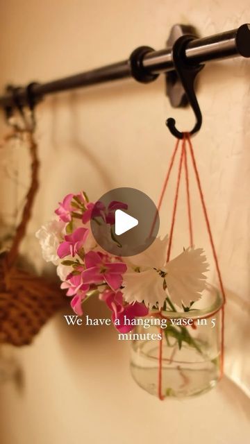 Style Estate Gardens on Instagram: "DIY Hanging Vase: Add a Touch of Handmade Charm to Your Space 🌷✂️  Transform any corner of your home with a simple and sweet DIY hanging vase! All you need is a clean glass jar (like an empty Oui yogurt jar), some yarn, and a bit of creativity.  Here’s how to make it:  	1.	Cut a length of yarn long enough to wrap around the neck of your jar with extra to hang. 	2.	Secure the yarn around the jar’s neck with a knot, creating a harness. 	3.	Tie the ends together to create a loop for hanging. 	4.	Add water and your favorite flowers, then hang it up for a delightful display!  Perfect for springtime vibes or a thoughtful handmade gift!  #DIY #Crafty #Handmade #HomeDecor #CreativeLife #ArtAndCraft #DoItYourself #HomeStyling #CraftsOfInstagram #DIYProject #Inst Mason Jar Plants, Oui Yogurt, Estate Gardens, Hanging Jars, Hanging Vase, Hanging Vases, Repurposed Items, Gift Diy, Hanging Flowers