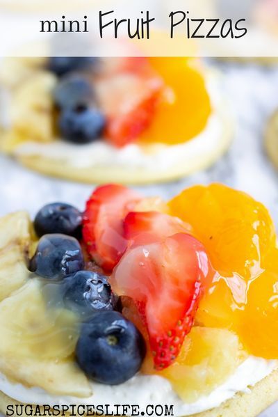 Mini Fruit Pizza: Individual sized fruit pizzas! Sugar cookie base with a cream cheese topping, fresh fruit, and a sweet glaze! Fruit Pizza Recipe With Glaze, Mini Fruit Pizza, Fruit Pizza Icing, Fruit Pizza Frosting, Fruit Pizza Bar, Fruit Pizzas, Fruit Pizza Designs, Fruit Pizza Sugar Cookie Recipe, Fruit Pizza Crust