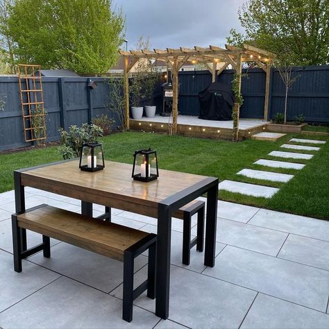 Jonny Sloane on Instagram: "Garden Transformation 🙌🏼 Gone is the new build strip of turf and replaced with a usable space. The garden feels so much bigger! I can’t wait to enjoy the space over the summer🌳 ☀️ #gardentransformation #gardendesign #gardeninspo #garden #zen #gardenfurniture #patio #porcelainpaving #pagoda #firepit #outdoorlighting #plants #gardenstyle #outdoorstyle #bbq #pizzaoven #pavingstonesdirectuklimited #stormgrey @brierdale_landscapes @jack.griff @paving_stones_direct_uk_lt New Build Garden Ideas, Modern Garden Patio, Turf Backyard, Garden Transformation, Modern Backyard Landscaping, Small Patio Garden, Back Garden Design, Garden Paving, Patio Garden Design