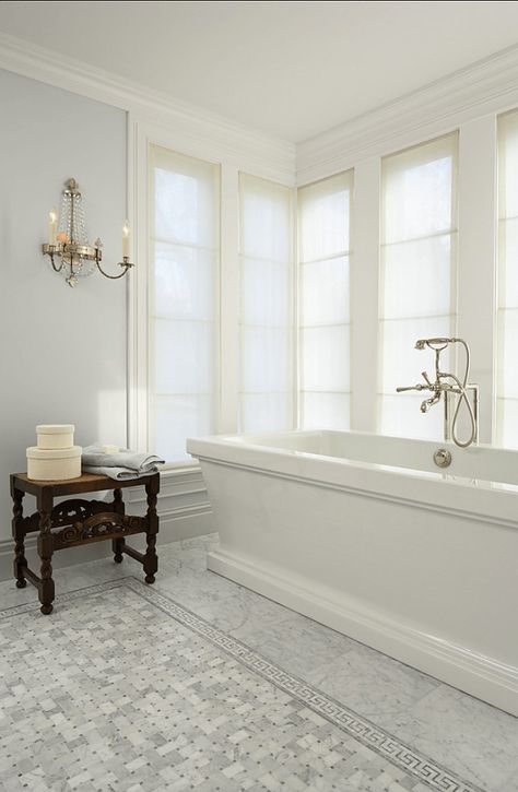 9 Fabulous Benjamin Moore Cool Gray Paint Colors - laurel home | Murphy Co. Design   Susan Gilmore [photo]    interior design – Marita Simmons | beautiful classic bathroom with pale gray walls and Carrera Marble Floor Tile Design, Grey Paint Colors, Classic Bathroom, Interior Design Photos, Subway Tiles, Bad Design, Design Del Prodotto, Bathroom Floor Tiles, Bath Tub