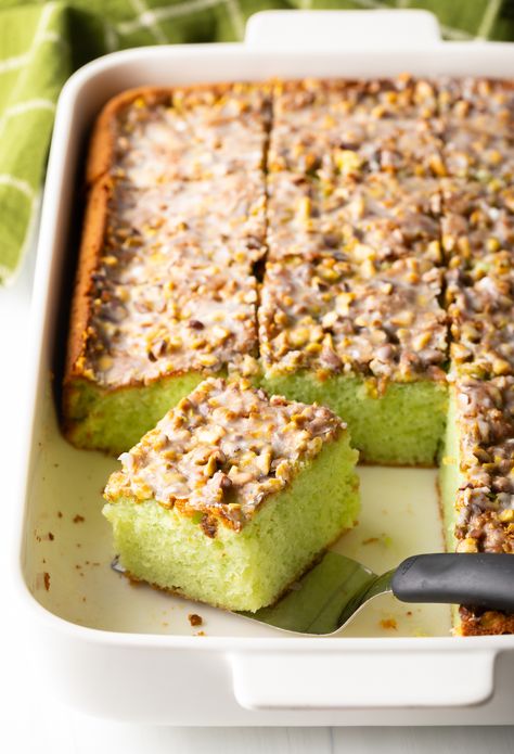 Easy Pistachio Poke Cake Recipe + VIDEO | A Spicy Perspective Pistachio Poke Cake, Pistachio Pudding Cake, Pistachio Dessert Pudding, Pistachio Cake Recipe, Homemade Vanilla Cake, Pudding Poke Cake, Pistachio Dessert, Poke Cake Recipe, Pistachio Recipes