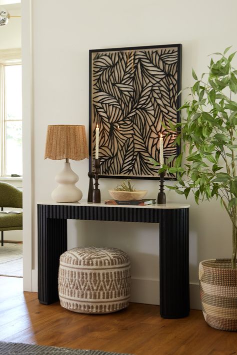 A refined statement piece, the Corey Onyx Wood Marble Top Fluted Console Table contrasts a fluted wood base in a dark onyx finish with a genuine white marble top. Pulling art deco-inspired design into the modern era, this elegant two-tone table is a bold addition to any room, hallway, or entry. #WorldMarket #LucianoLiving #EntrywayDecor #MoodyDecor #FlutedTable #EntryTable #ConsoleTable Fluted Console Table, Art Deco Entryway, Shadow Box Wall Art, Leaf Shadow, Designer Console Table, Unique Console Table, Art Deco Console, Shadow Box Wall, Art Deco Ideas