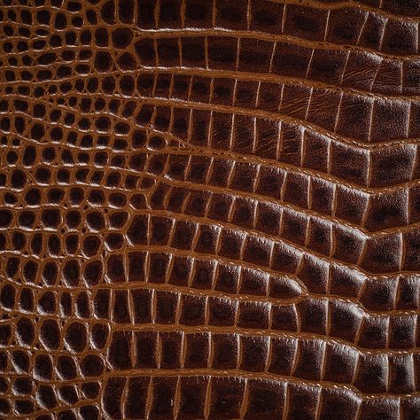 See you later, alligator! Choose this Lorraine Italian Chocolate Semi-Aniline Alligator Embossed Top Grain Cow Leather Hide to say goodbye to your old furniture and say hello to exciting reupholstery! Tanned and finished by hand in Italy, this rich dark brown leather features a subtle multi-tonal effect and textural embossed alligator pattern. A natural paraffin finish lends exceptional luster and higher durability, making this leather suitable for projects meant to last a lifetime. Tactile and Brown Leather Texture, Fabric Texture Pattern, Later Alligator, See You Later Alligator, Italian Chocolate, Iconic Wallpaper, Photoshop Projects, Brown Texture, Chocolate Leather