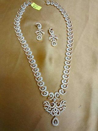 White Stone Long Haram, White Stone Haram, Diamond Haaram, White Stone Jewelry, Gold Stone Necklace, Haram Designs, Stone Jewellery Designs, Long Haram, Indian Bridal Jewelry Sets