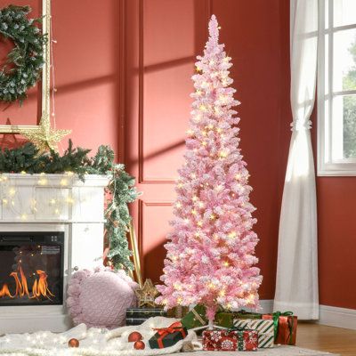 This pre-lit artificial Christmas tree features warm white LED lights and snow-clustered pink leaves, bringing a warm and unique holiday feel to your home, retaining its shape and offering a safe choice. STYLISH Size: 6.11' | STYLISH Prelit Snow Flocked Artificial Christmas Tree w/ Pencil Shape, Pine Realistic Branches, Warm White LED Lights, Auto Open | Home Decor | TKJS5642_103718573 | Wayfair Canada Barbie Ornament Christmas Tree, Pink Themed Christmas Tree, Pink Christmas Trees, Artificial Xmas Trees, Led Christmas Tree Lights, Dark Goddess, Snow Flock, Pre Lit Christmas Tree, Babe Cave