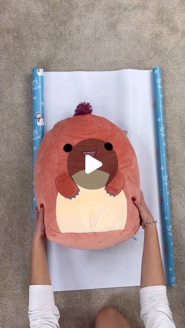 LENNIA (Folding Queen 👑) on Instagram: "How to gift wrap an oversized squishmallow (20 inches) #wrappinghack #wrappingpresents #giftwrapping" Big Stuffed Animal, Helpful Hacks, How To Wrap, Present Wrapping, December 19, Animal Gifs, Soft Toy, Gift Wrap, Helpful Hints