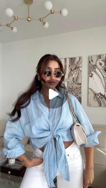 Sepideh Ghmi on Instagram: "How To Front-Tie Your Button Up Shirts 💠  #fashionhacks  #styletips #shirthack" How To Tie Polo Shirt Women, Tied Tops Outfit, How To Style A Long Sleeve Button Up, How To Make A Button Up Shirt Look Cute, How To Front Tie A Shirt, How To Front Tie A Button Up Shirt, Button Up Shirt With Dress, Button Down Hacks, How To Tie Button Up Shirt