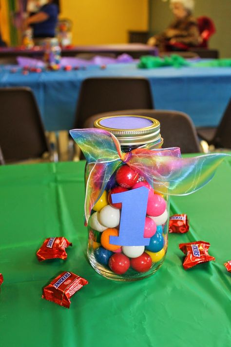 One Year Old Party Centerpieces, Jar Centerpieces Birthday, Pocoyo Centerpiece Ideas, Cocomelon Centerpieces Girl, Coco Melon Centerpieces, 2nd Birthday Centerpieces, Mason Jar Centerpieces For Birthday, Cocomelon Party Centerpieces, Cocomelon Table Centerpiece