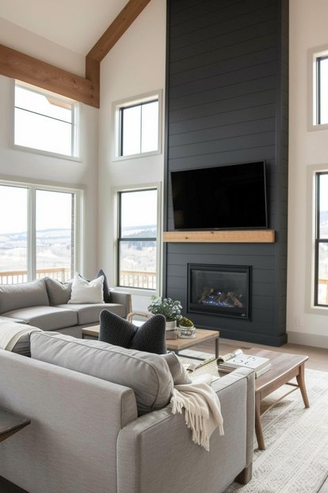 Design the perfect living room with these black shiplap fireplace tips. Modern Shiplap Fireplace Wall, Shiplap Fireplace With Hearth, Shiplap Family Room, Living Room Shiplap Accent Wall, Black Shiplap Fireplace, Black Shiplap, Modern Farmhouse Fireplace, Shiplap Accent Wall, Black Fireplace