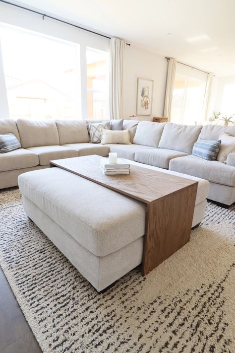 DIY Over-Ottoman Coffee Table – Home with Emily Jean Coffee Tables Ottoman, Living Room Designs Ottoman, Grey Couch With Ottoman Living Room, Cozy Ottoman Coffee Tables, Sectional Ottoman Ideas, Ottoman With Leather Couch, Living Room Decor Ottoman, Couch And Ottoman Ideas Living Room, Coffee Table Over Ottomans Diy