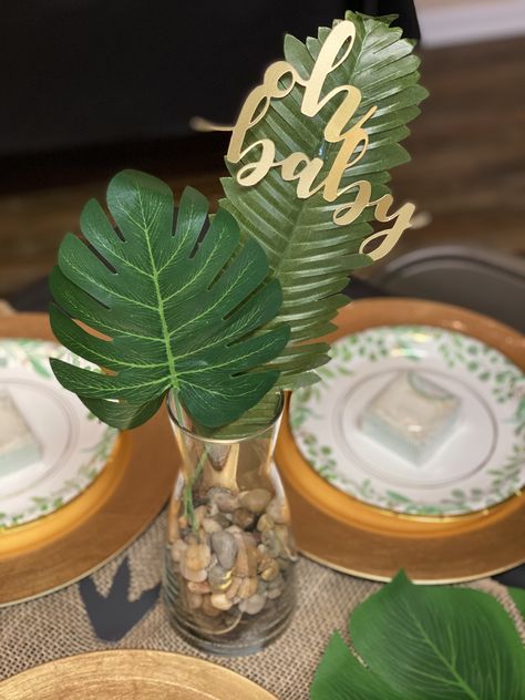 Jungle Dinosaur Party, Dino Themed Centerpieces, Dino Table Centerpiece, Jungle Safari Centerpieces Ideas, Wild Baby Shower Theme Boy, Gold And Green Baby Shower Ideas, Table Centerpieces For Baby Shower Boys, Safari Theme Centerpieces Diy, Jungle Baby Shower Theme Centerpieces