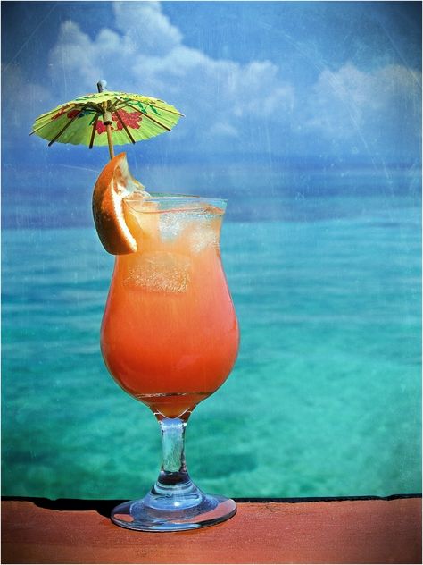 Since the water is too salty, umbrella drinks will be the way to go. Coconut Rum Cocktails, Bacardi 151, Planters Punch, Coctails Recipes, Malibu Rum, Beach Drinks, Rum Cocktails, Light Rum, Orange Slice