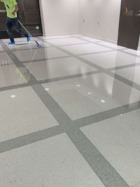 Installation of new terrazzo flooring for a Naval Office. Doyle Dickerson Terrazzo installer applying multiple coats of sealer, which protects the terrazzo floor from stains. #terrazzo #flooring #commercialflooring Marble Tiles Floor, Parking Tiles Design, Terrazo Flooring, Stairs Tiles Design, Floor Pattern Design, Hall Tiles, Marble Flooring Design, Terrazzo Floor, Terrazzo Design