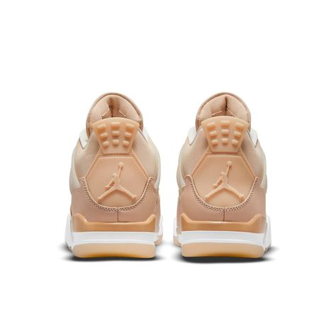 The Wmns Air Jordan 4 Retro "Shimmer" offers a fresh take on the classic basketball design. The shoe's upper is made of leather, finished in a series of tan hues and complemented by the quarter panel netting. Molded eyelets secure the fit, while the tongue includes metallic silver Jumpman branding to highlight the look. Underfoot, the midsole houses the usual visible Air in the heel to provide cushioning, giving way to a herringbone rubber outsole for traction. Air Jordan 4 Shimmer, Jordan 4 Shimmer, Jordan 4 Retro Shimmer, Nike Air Jordan 4, Jordan Retro 4, Jordan Model, 40 Women, Jordan 11 Retro Low, Retro 4