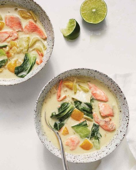 Spicy Coconut-Salmon Curry Recipe | Martha Stewart Living _ This easy riff on a Thai staple gets big flavor from four basic ingredients: curry paste, coconut milk, yellow bell pepper, and bok choy. Coconut Salmon, Salmon Curry, Yellow Bell Pepper, Curry Stew, Spring Menu, Salmon Seasoning, Cooking Salmon, Think Food, Curry Paste