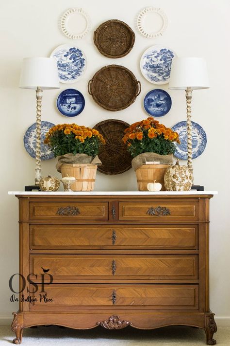 Fall Decor - Natural Elements: Potted Mums (love Bronze with the Blue & White Plates) - Best DIY Decorating Tips | Examples and ideas from On Sutton Place Couple Basket, Basket Couple, Fireplace Basket, Boyfriend Basket, Basket Jordan, Closet Baskets, Plate Wall Display, Basket Illustration, Basket Stand